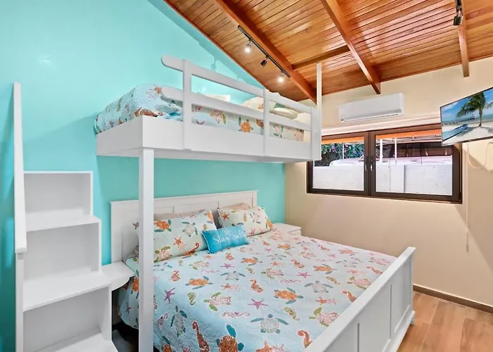 Stylish 2-bedroom With Ocean-view Deck, Lush Pool Area & 2-minute Walk To Flamingo